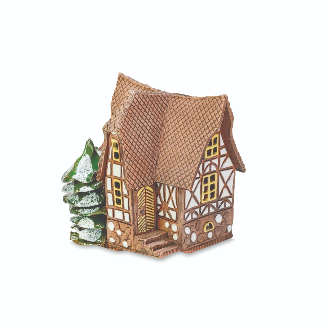 Ceramic miniature of a fantasy house with the tree